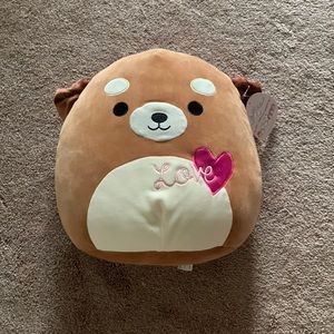 Dog Squishmallow named Duffy